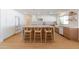 Modern kitchen with a large center island, custom cabinetry, and stainless steel appliances at 7127 N 79Th St, Scottsdale, AZ 85258