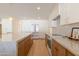 Gourmet kitchen with stainless steel appliances, a large island, and ample counter space at 7127 N 79Th St, Scottsdale, AZ 85258