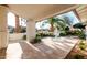 Charming covered patio with a water fountain and lush landscaping for relaxing outdoors at 7127 N 79Th St, Scottsdale, AZ 85258