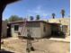 Exterior shot of backyard with various structures, reflecting the property's outdoor space and features at 717 W Lynwood St, Phoenix, AZ 85007