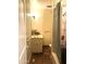 This bathroom features a sink, shower, and tile flooring at 717 W Lynwood St, Phoenix, AZ 85007