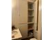 This bathroom features a sink, toilet, and storage at 717 W Lynwood St, Phoenix, AZ 85007