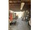 View of a spacious garage, ideal for storage and workspace, featuring ample shelving at 717 W Lynwood St, Phoenix, AZ 85007