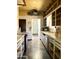 Practical kitchen with vintage appliances and ample counter space at 717 W Lynwood St, Phoenix, AZ 85007