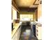 Well-lit kitchen featuring classic fixtures and functional layout at 717 W Lynwood St, Phoenix, AZ 85007