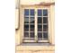 Exterior window, with peeling paint showing opportunities for property improvement, ready for renovation and restoration at 717 W Lynwood St, Phoenix, AZ 85007