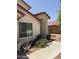 Front entrance with arched entryway and desert landscaping at 723 W Milada Dr, Phoenix, AZ 85041