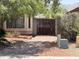 Paver walkway leads to front gate, with mature plants and desert landscaping at 723 W Milada Dr, Phoenix, AZ 85041