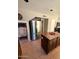 Features stainless steel refrigerator, island, and tile flooring at 723 W Milada Dr, Phoenix, AZ 85041