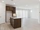 Bright kitchen featuring modern appliances, a center island and lots of space at 7369 W Buckhorn Trl, Peoria, AZ 85383