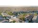 Aerial view of desert community featuring backyards with pools and lush landscaping at 7618 S Lone Pine Pl, Gold Canyon, AZ 85118