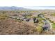 Expansive aerial view showing the layout of homes in this desert community at 7618 S Lone Pine Pl, Gold Canyon, AZ 85118