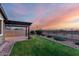 Backyard showcasing a pergola, manicured lawn, and desert views at 7618 S Lone Pine Pl, Gold Canyon, AZ 85118