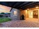 Covered patio with pavers, perfect for outdoor dining and relaxation at 7618 S Lone Pine Pl, Gold Canyon, AZ 85118
