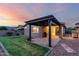 Outdoor patio area featuring pavers, a pergola, and desert views at 7618 S Lone Pine Pl, Gold Canyon, AZ 85118