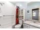 Bright bathroom featuring a shower-tub combo and granite vanity at 7618 S Lone Pine Pl, Gold Canyon, AZ 85118