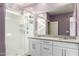 Modern bathroom showcasing a glass shower and double sink vanity at 7618 S Lone Pine Pl, Gold Canyon, AZ 85118