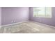 Bright bedroom featuring soft carpet and a large window providing natural light at 7618 S Lone Pine Pl, Gold Canyon, AZ 85118