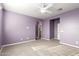 Generously sized bedroom with carpet, ceiling fan and walk-in closet at 7618 S Lone Pine Pl, Gold Canyon, AZ 85118