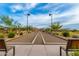 Bocce ball courts are surrounded by desert landscaping and seating at 7618 S Lone Pine Pl, Gold Canyon, AZ 85118