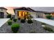 Landscaped front yard featuring decorative rock and desert plants at 7618 S Lone Pine Pl, Gold Canyon, AZ 85118