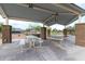 Community pavilion with picnic tables and BBQ grills at 7618 S Lone Pine Pl, Gold Canyon, AZ 85118