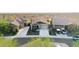 Aerial view of desert neighborhood featuring well-maintained homes and native vegetation at 7618 S Lone Pine Pl, Gold Canyon, AZ 85118