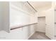 Spacious walk-in closet with shelves and bars for ample storage at 7618 S Lone Pine Pl, Gold Canyon, AZ 85118
