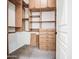 Spacious walk-in closet with built-in shelving and drawers at 853 E Ivanhoe Ct, Gilbert, AZ 85295