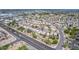 Expansive aerial view of a residential community with single-Gathering homes and well-maintained landscaping at 910 S Crossbow Ct, Chandler, AZ 85225