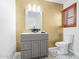 Stylish bathroom with a modern vanity, vessel sink, and unique decorative touches at 910 S Crossbow Ct, Chandler, AZ 85225
