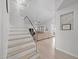 Inviting entryway showcasing an open staircase and seamless flow into the spacious living area at 910 S Crossbow Ct, Chandler, AZ 85225