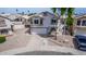 Charming two-story home featuring a clean driveway and a well-maintained front yard at 910 S Crossbow Ct, Chandler, AZ 85225