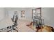 Spacious office area featuring custom wood windows, wood floors, and a work area at 910 S Crossbow Ct, Chandler, AZ 85225
