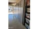 Spacious garage features built-in cabinets for ample storage and an epoxy floor for a clean, modern look at 9678 W Patrick Ln, Peoria, AZ 85383