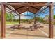A covered picnic area overlooks a playground with slides, climbing structures, and play equipment at 9678 W Patrick Ln, Peoria, AZ 85383