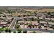 Aerial view of neighborhood streets with well-maintained homes, desert landscaping, and community parks in a Gathering-friendly area at 10359 E Los Lagos Vista Ave, Mesa, AZ 85209
