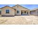 Large backyard with desert landscaping and privacy fence, offering ample space at 10548 W Crown King Rd, Tolleson, AZ 85353