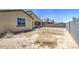 Spacious backyard featuring desert landscaping and block wall for added privacy at 10548 W Crown King Rd, Tolleson, AZ 85353