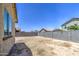 Spacious backyard surrounded by block wall fence offers privacy and ample potential at 10548 W Crown King Rd, Tolleson, AZ 85353