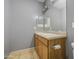 A bathroom featuring a double vanity, tiled floors and lots of wall space at 10548 W Crown King Rd, Tolleson, AZ 85353