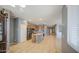 Expansive living area features tile flooring and seamless flow into the kitchen with modern appliances at 10548 W Crown King Rd, Tolleson, AZ 85353
