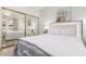 Bedroom with a large mirrored closet and modern decor at 10863 N 117Th Pl, Scottsdale, AZ 85259