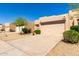 Inviting one-story home with desert landscaping, two-car garage and a cozy front entrance at 10863 N 117Th Pl, Scottsdale, AZ 85259