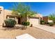 Charming one-story home with desert landscaping, two-car garage and a cozy front entrance at 10863 N 117Th Pl, Scottsdale, AZ 85259