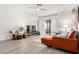 Bright living room with stylish modern furniture, lots of light and a ceiling fan at 10863 N 117Th Pl, Scottsdale, AZ 85259