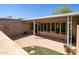 Outdoor patio area with artificial turf at 11141 W Cameo Dr, Sun City, AZ 85351