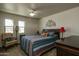 Comfortable bedroom with ceiling fan and lots of natural light at 11141 W Cameo Dr, Sun City, AZ 85351