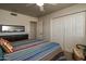Spacious bedroom with large closet and neutral colors at 11141 W Cameo Dr, Sun City, AZ 85351