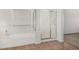 Bright bathroom features separate tub and shower with neutral floors and plenty of natural light at 11303 E Pratt Ave, Mesa, AZ 85212